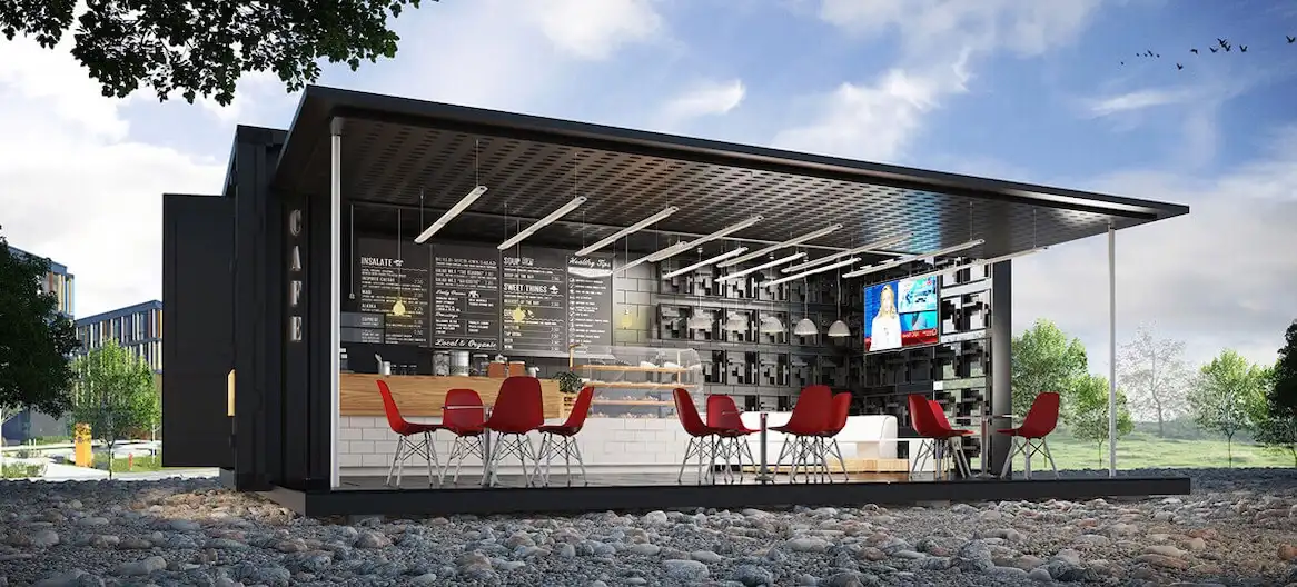 modern-shipping-container-cafe-retail-kiosk Modern black shipping container cafe with a large awning, outdoor seating, and menu boards, demonstrating retail customization.
